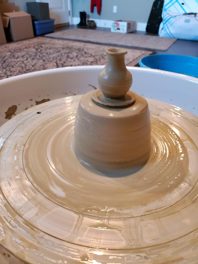Throwing a tiny pot on the pottery wheel at Armbrust Pottery